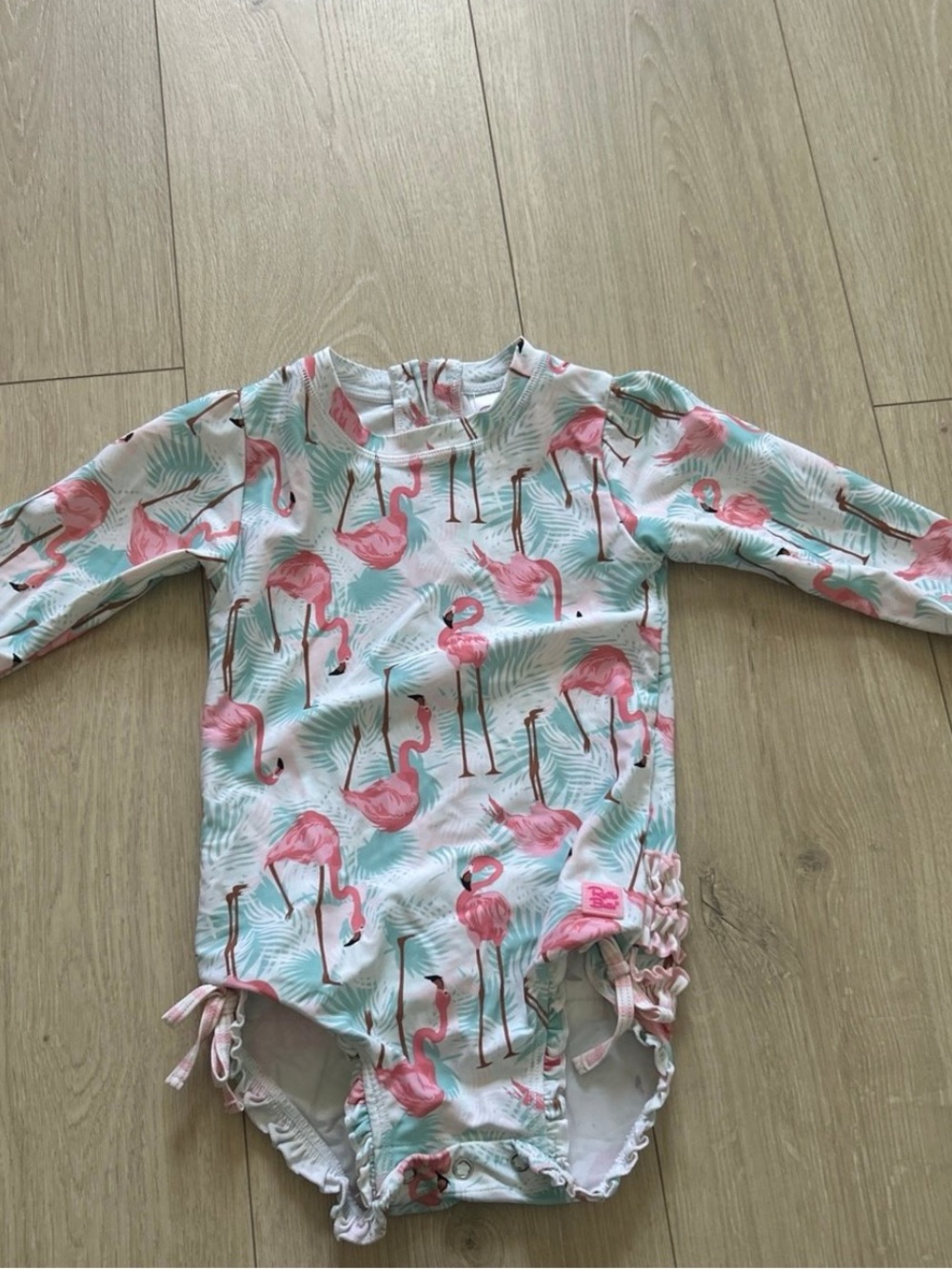 RUFFLEBUTTS Pink Flamingo Long Sleeve One-Piece Swimsuit